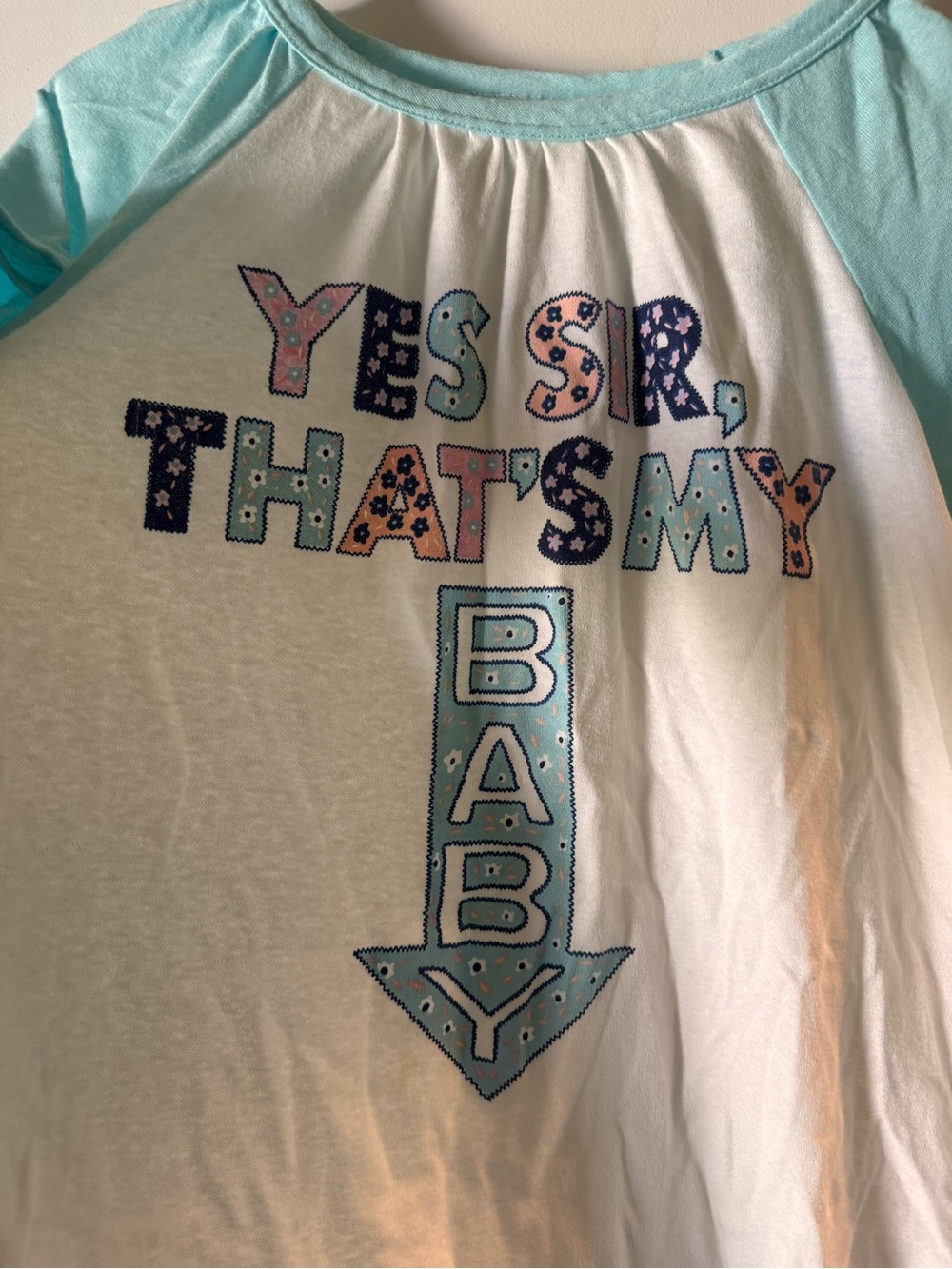 MaternityWhite Tee with Light Aqua Raglan Sleeves - Playful Graphic